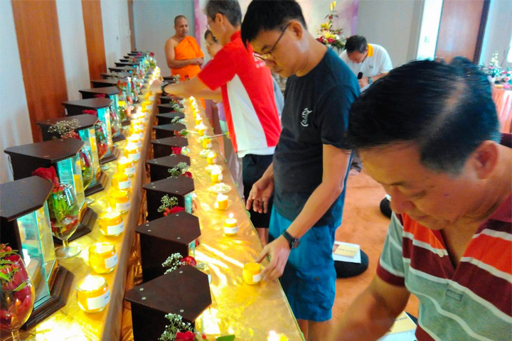 Dhamma Day 2019 Offering Candles to the Buddha in Buddhist Library